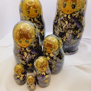 Elegant Gold and Purple Russian Nesting Dolls